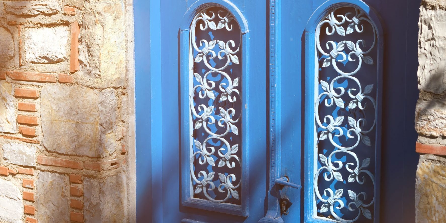 beautiful-house-door-on-old-stone-historical-building-in-sunlight